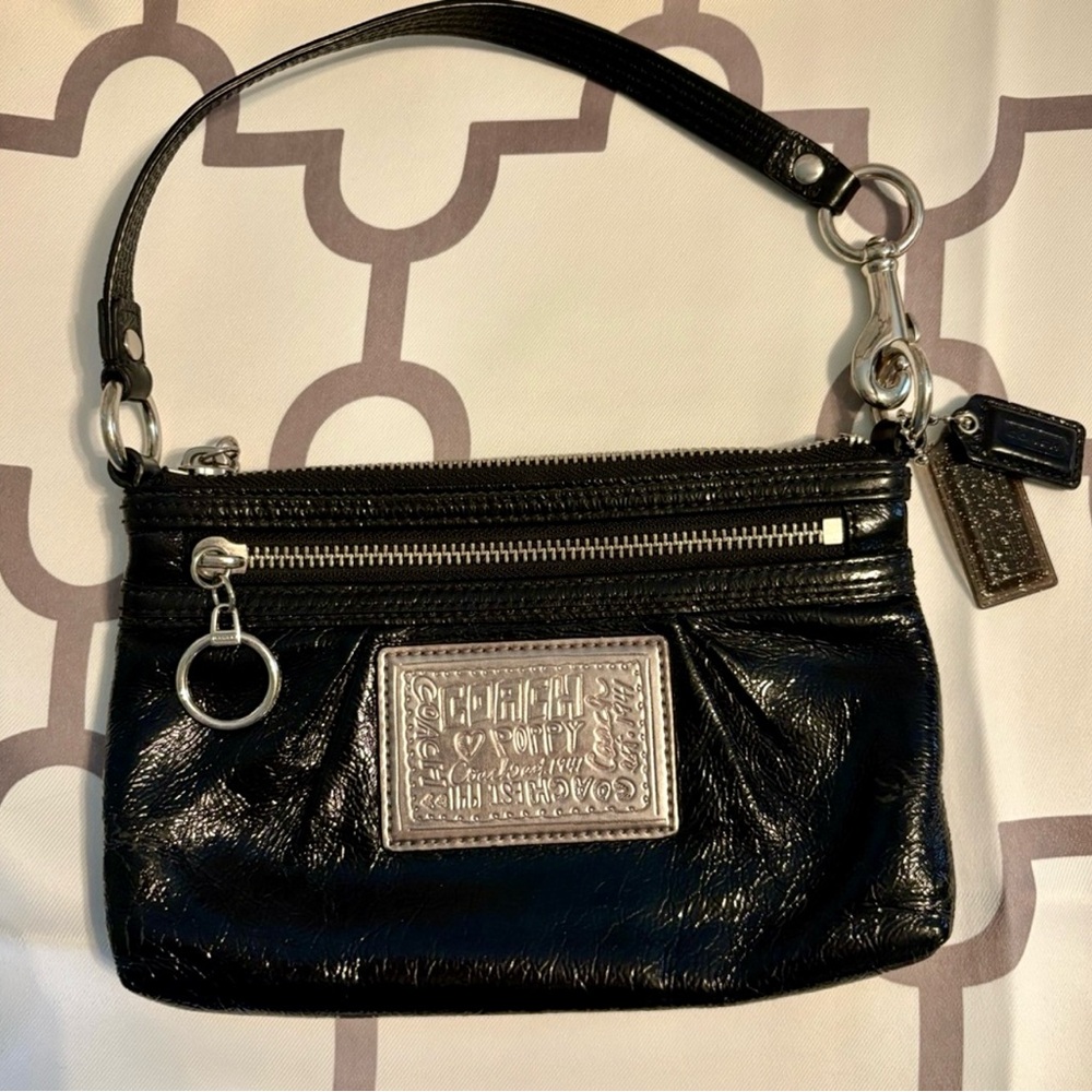 Coach Poppy Black Patent Wristlet with light grey Leopard Interior